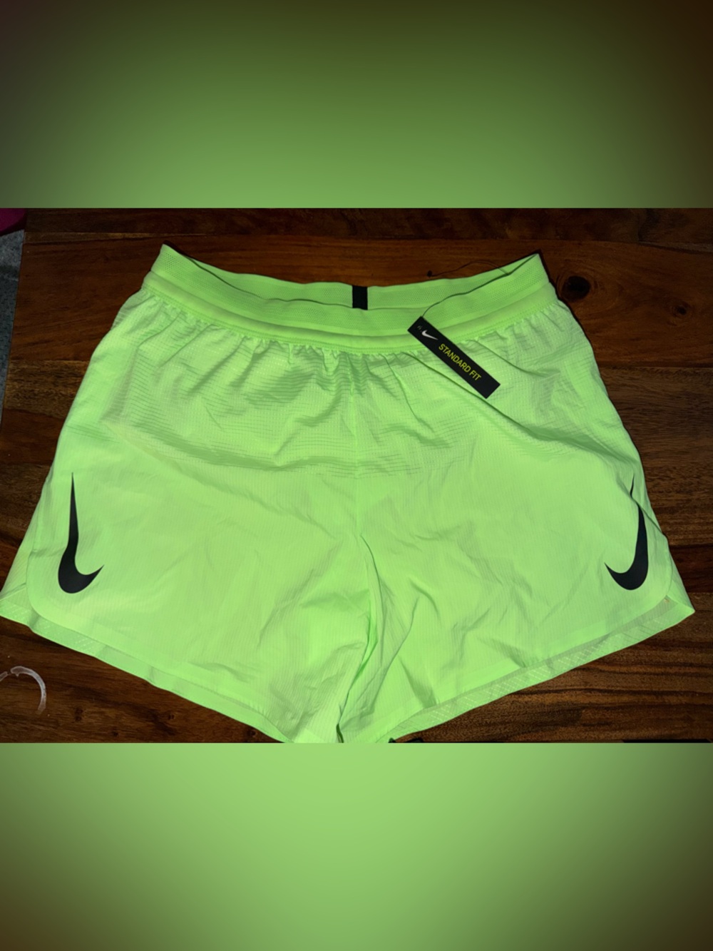 Nike Women’s Neon Green Athletic Shorts with Black Swoosh